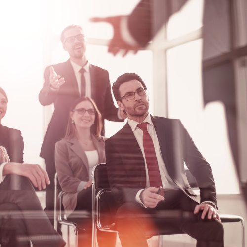 Head,And,Business,Team,At,A,Business,Meeting,To,Discuss